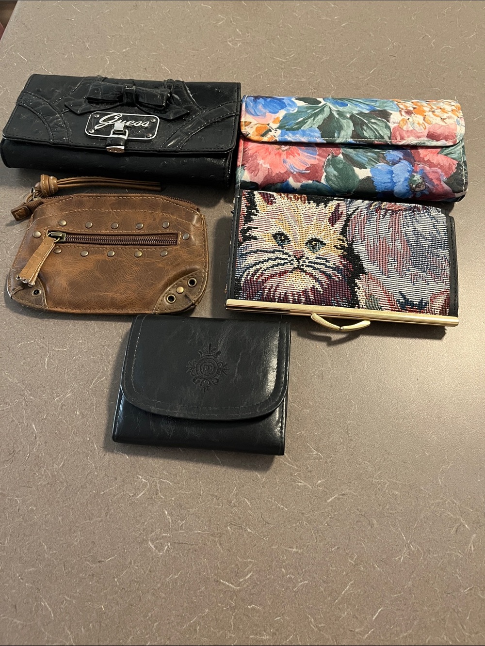 Lot of Misc Ladies and Men’s wallets - Guess, tapestry cat wallet & more